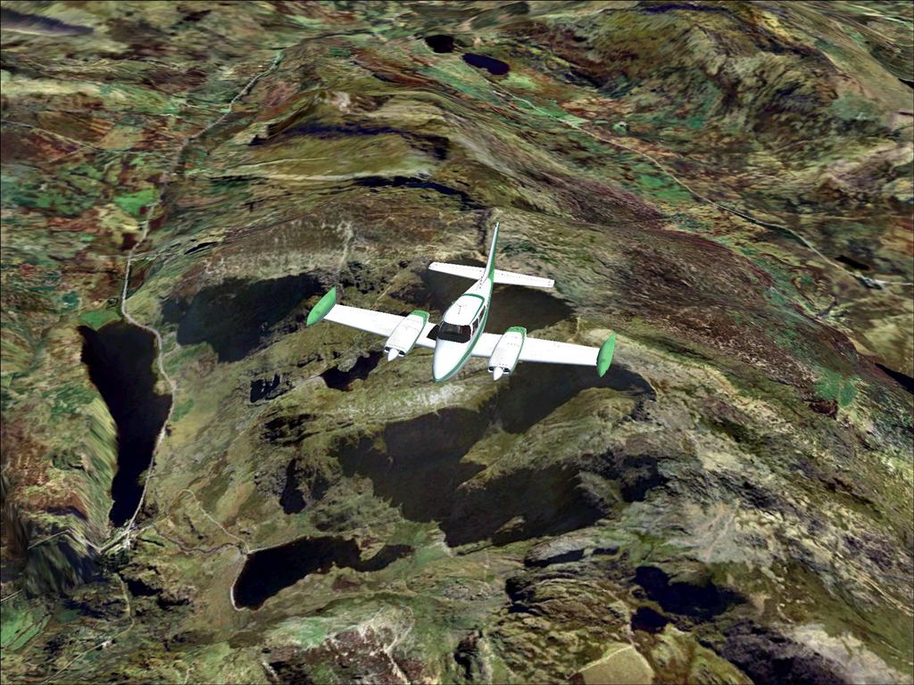 Cessna 310 over Snowdonia